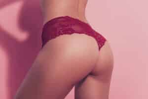 Close up of woman's bottom in lace underwear after healing from Brazilian Butt Lift