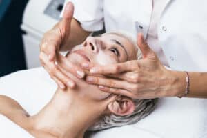 Woman getting a facial treatment